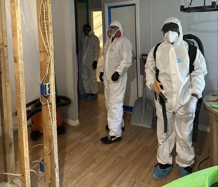 SERVPRO team in PPE at a biohazard worksite